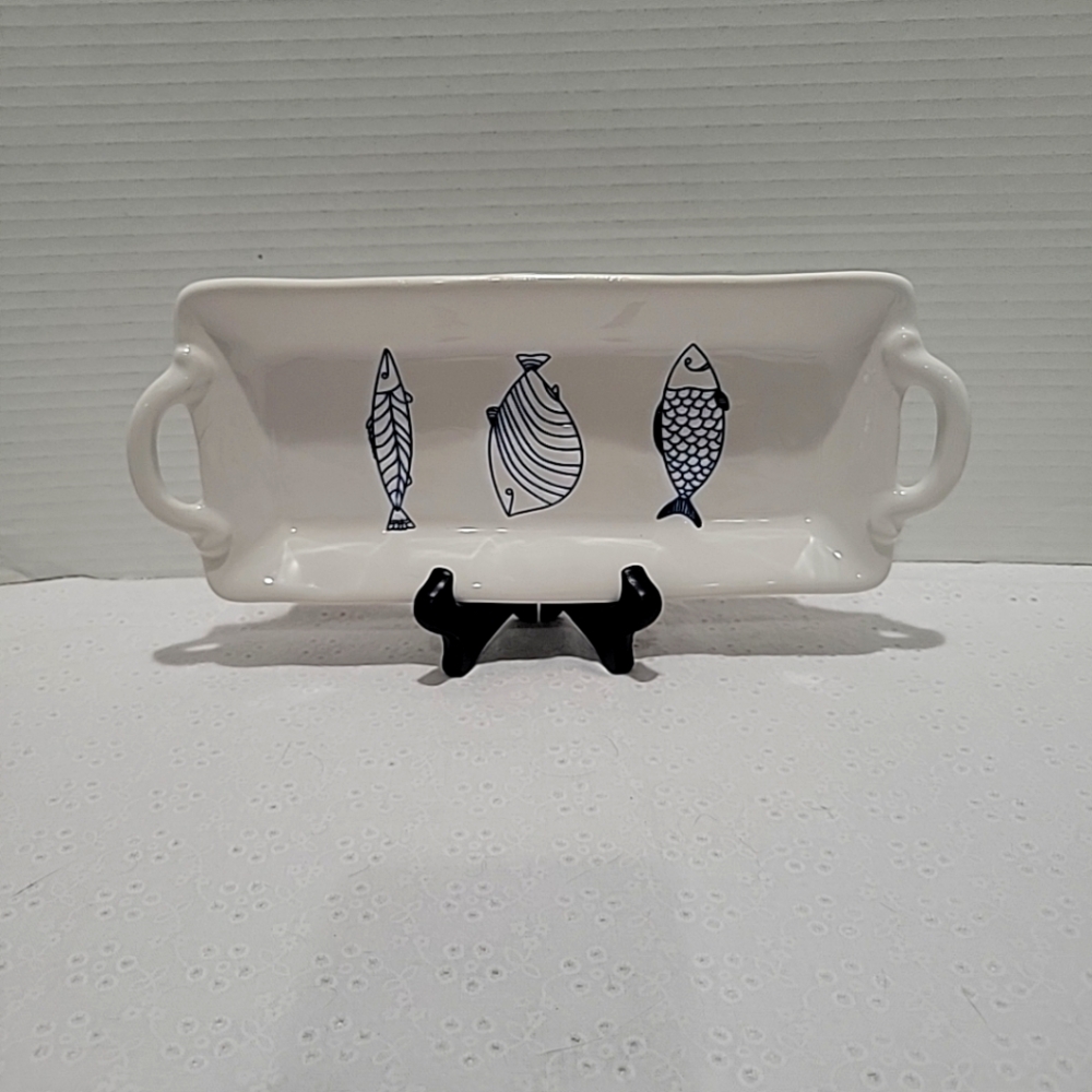 Pier 1 blue and white stonewear with various fish designs Hors d Deuvres